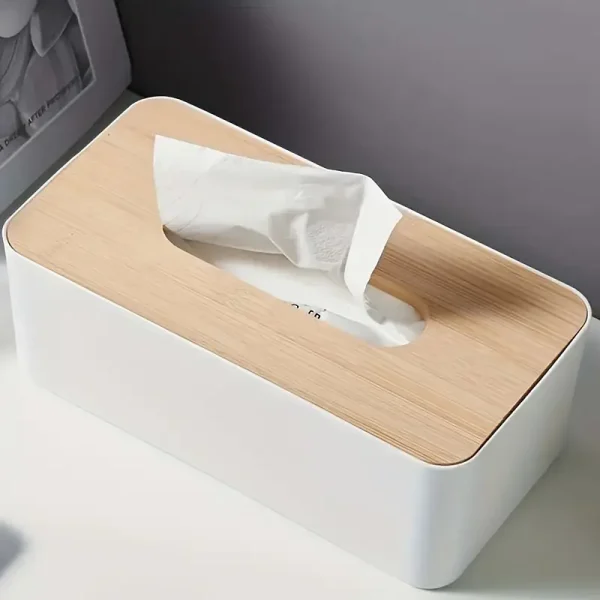 A tissue box with a plastic base and bamboo lid